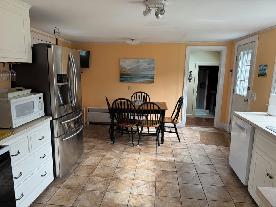 Kitchen view from DR. Kitchen has all major appliances.