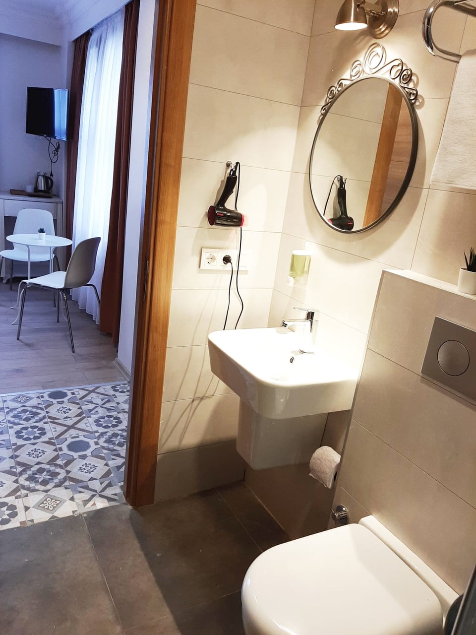 Shower, free toiletries, hair dryer, slippers