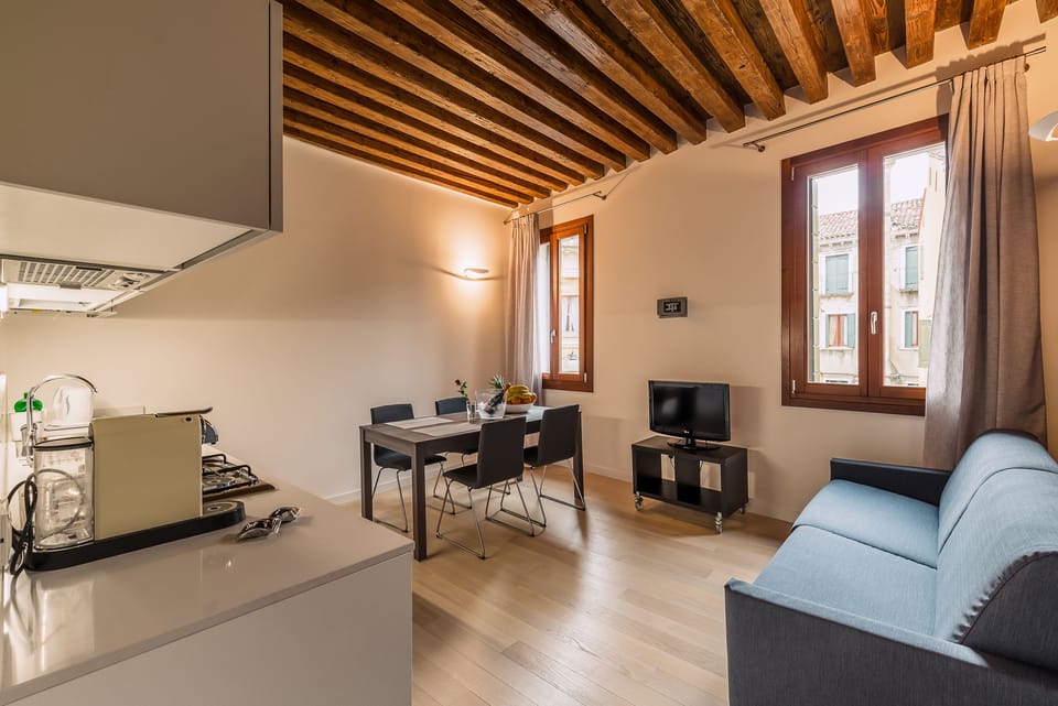 Deluxe Apartment, 2 Bedrooms (2 floor) | Living area | Flat-screen TV