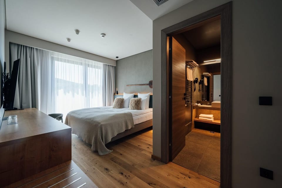 Deluxe Apartment, 2 Bedrooms, Balcony, Valley View | Free minibar, in-room safe, desk, laptop workspace
