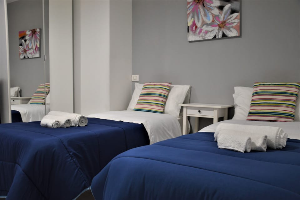 Classic Twin Room, 2 Twin Beds, Private Bathroom, City View | Minibar, in-room safe, desk, iron/ironing board