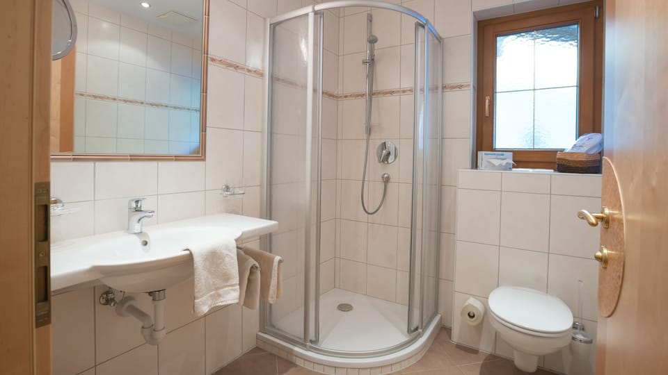 Shower, free toiletries, hair dryer, bathrobes