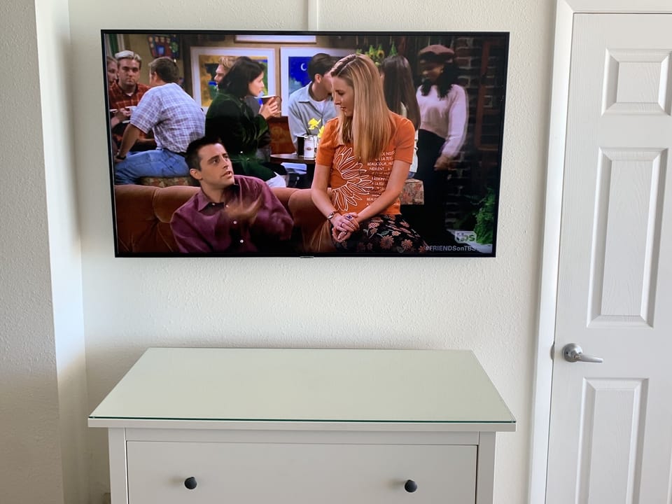 Master bedroom has large smart tv with upgraded cable 