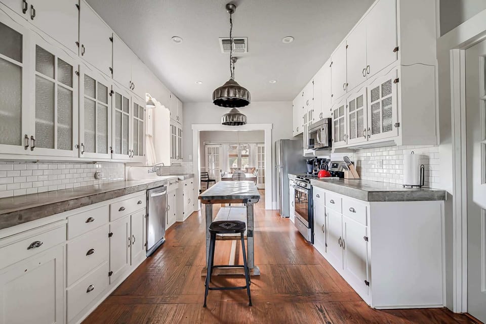Cook, gather, and unwind in this sunlit kitchen filled with character and warmth.