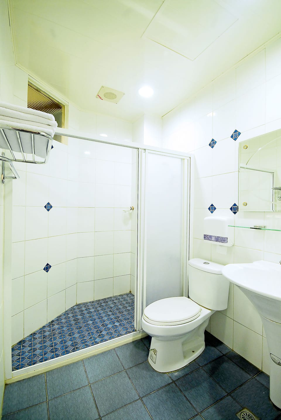 Shower, free toiletries, hair dryer, slippers
