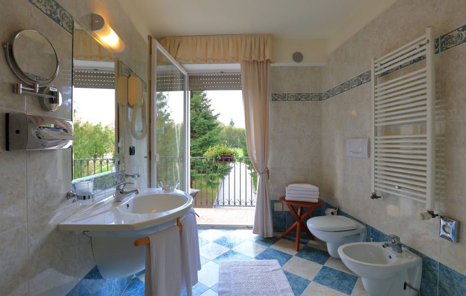 Shower, free toiletries, hair dryer, slippers