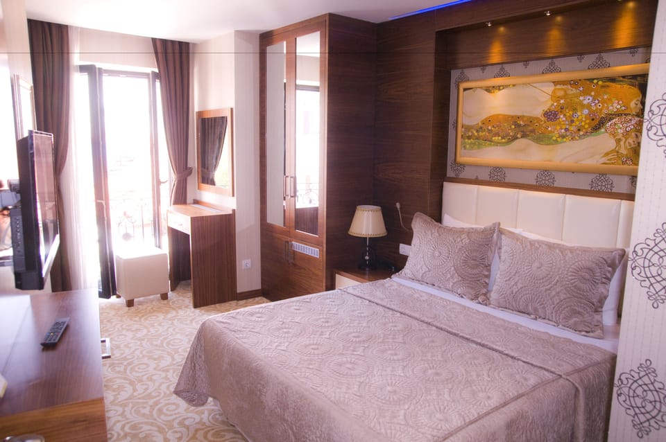 Deluxe Double Room | Premium bedding, minibar, desk, soundproofing
