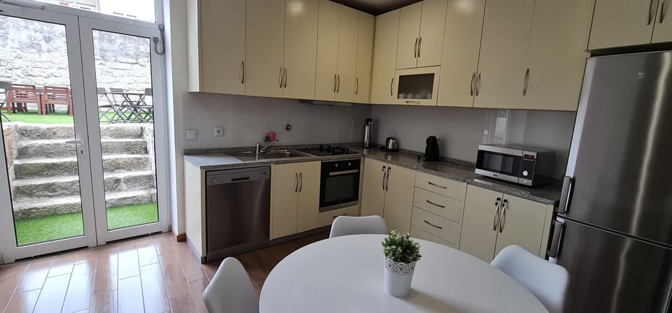 Family House | Private kitchen | Full-size fridge, microwave, oven, stovetop