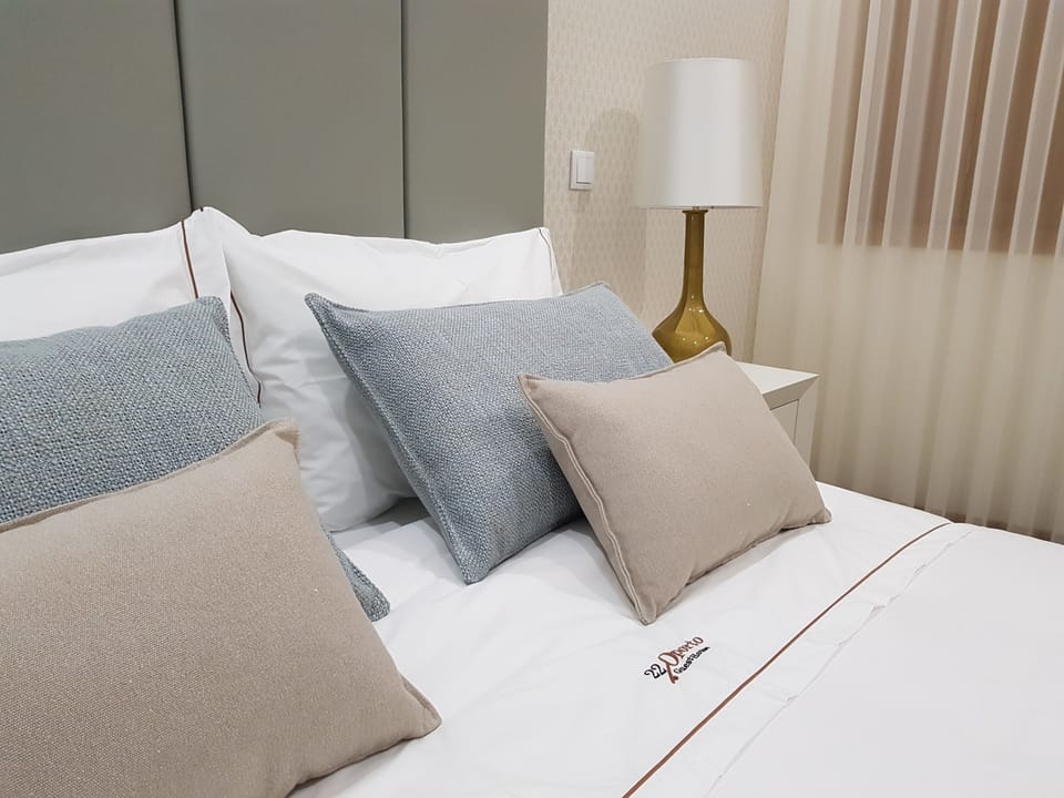 Premium bedding, down comforters, soundproofing, iron/ironing board
