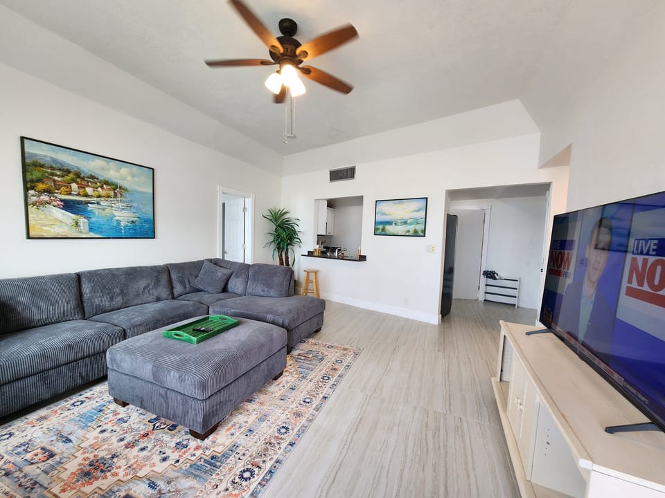 Spacious living room with comfy sofa ,smart TV.