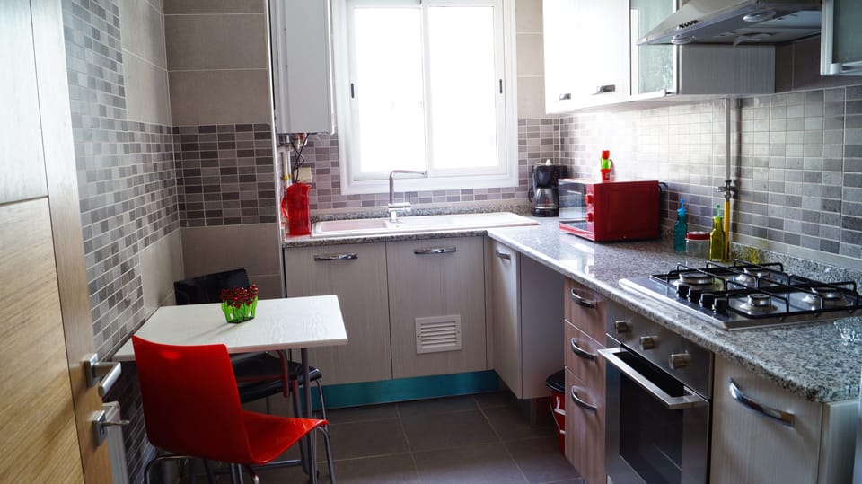 Apartment, 1 Bedroom | Private kitchen | Full-size fridge, microwave, oven, stovetop