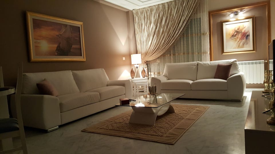 Apartment, 2 Bedrooms | Living room | 42-inch flat-screen TV with satellite channels, TV