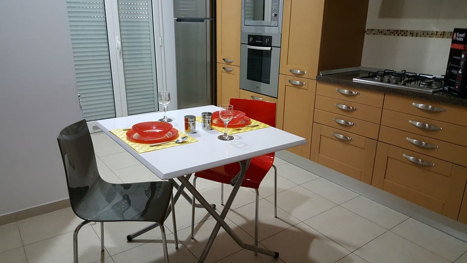 Apartment, 2 Bedrooms | Private kitchen | Full-size fridge, microwave, oven, stovetop