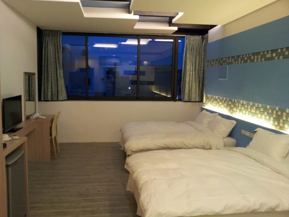Standard Quadruple Room, 1 Bedroom | Desk, blackout drapes, soundproofing, free WiFi