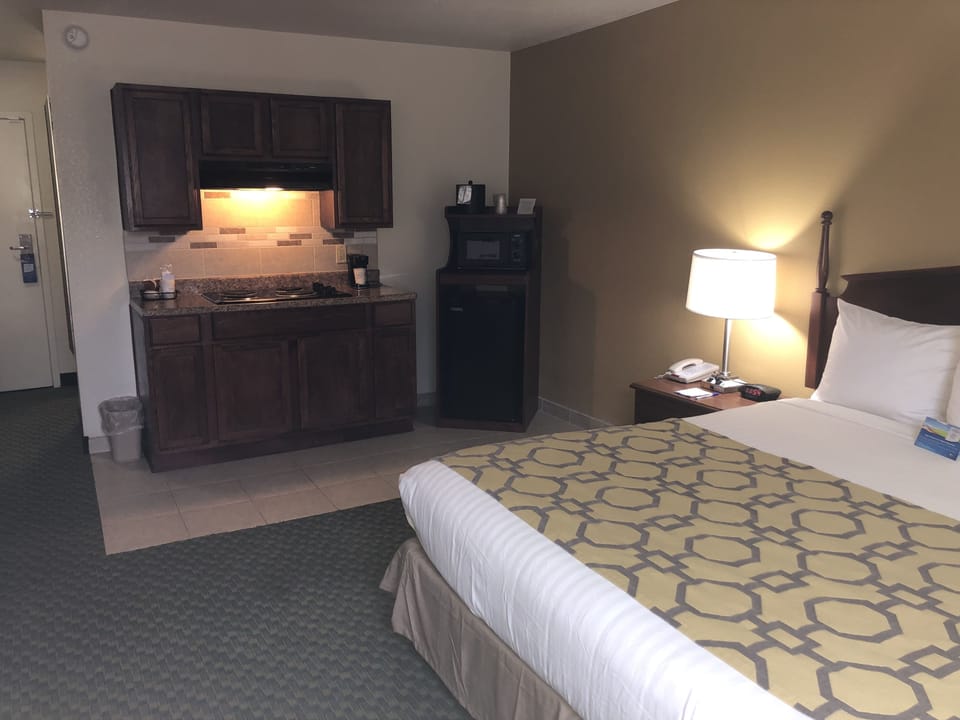 Efficiency, Room, 1 King Bed, Non Smoking | In-room safe, desk, iron/ironing board, free cribs/infant beds