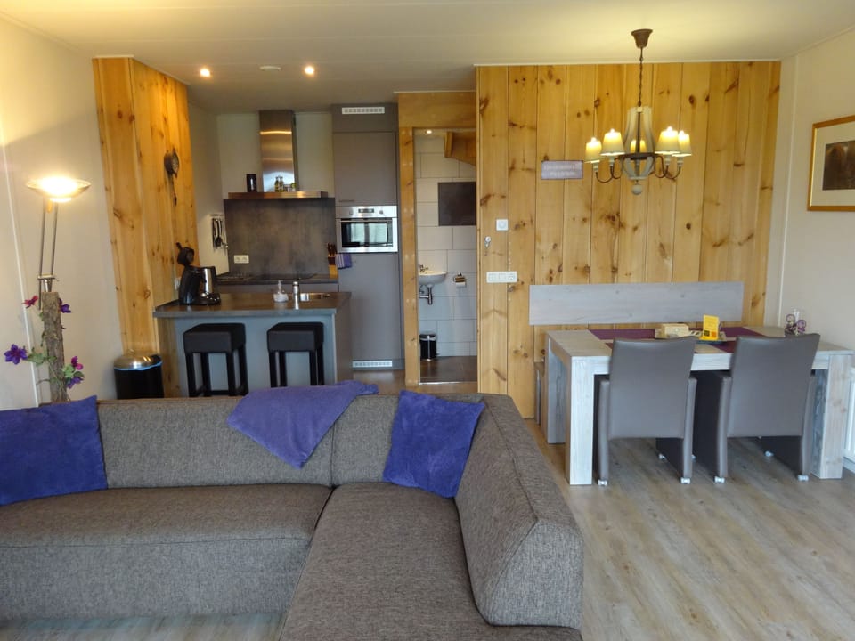 Apartment, 2 Bedrooms | Living area | Flat-screen TV, fireplace, table tennis