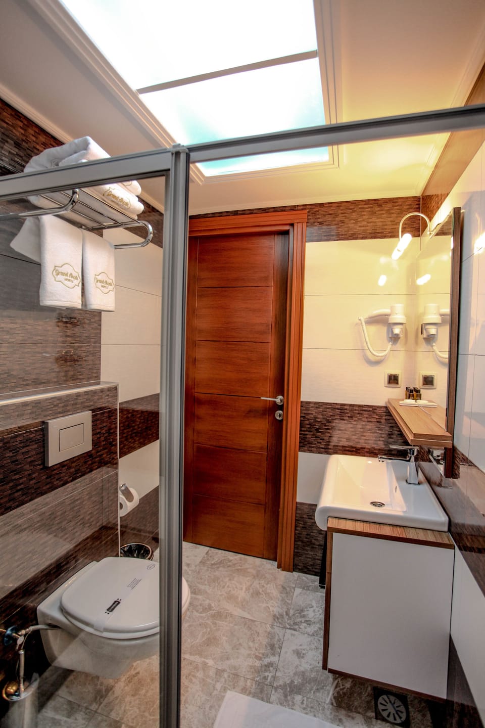 Shower, free toiletries, hair dryer, slippers