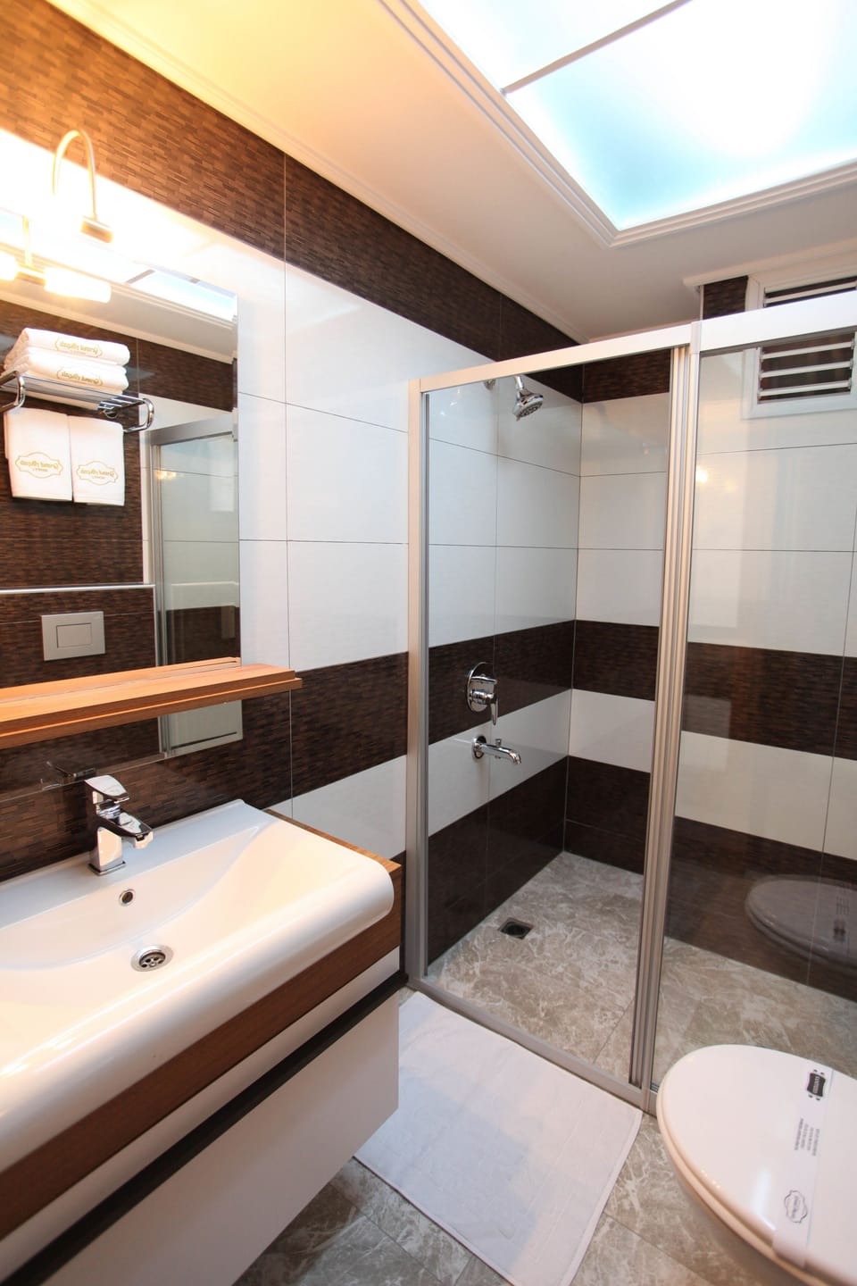 Shower, free toiletries, hair dryer, slippers
