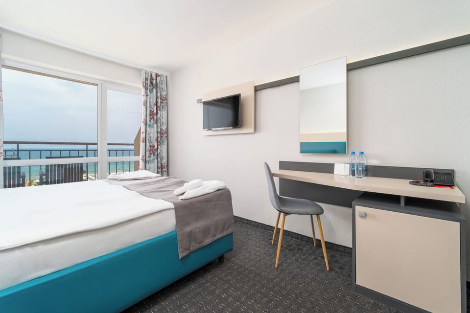 Standard Double or Twin Room | In-room safe, blackout drapes, iron/ironing board