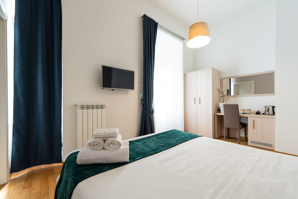 Deluxe Room | Premium bedding, down comforters, minibar, in-room safe