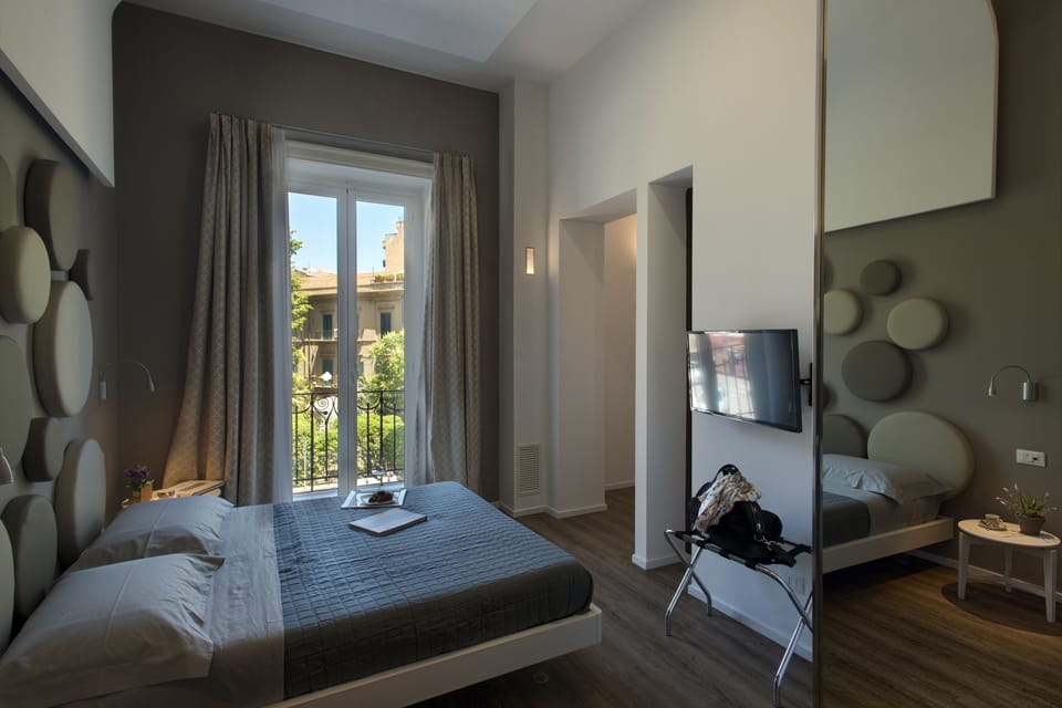 Superior Quadruple Room (Normanni) | Premium bedding, minibar, in-room safe, desk