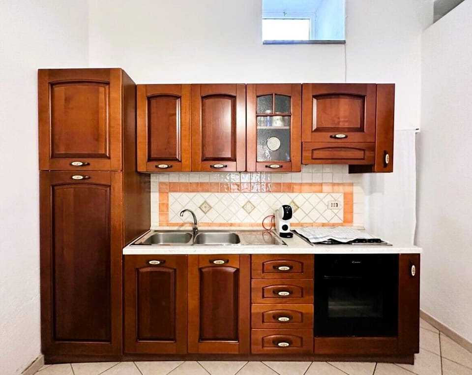Apartment, Terrace, Partial Sea View | Private kitchen | Full-size fridge, stovetop, espresso maker, coffee/tea maker