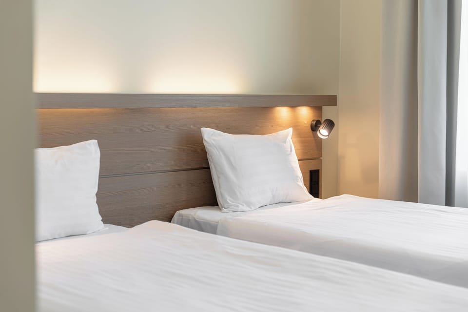 Modern Superior Double or Twin Room | Minibar, in-room safe, desk, blackout drapes