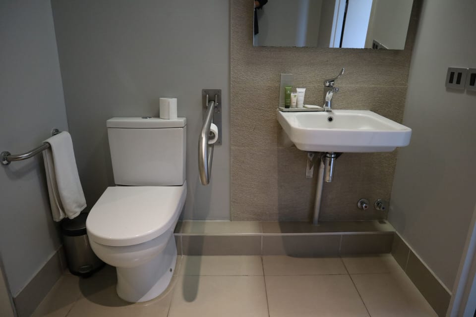 Studio, 1 King Bed, Accessible, Non Smoking | Bathroom | Shower, rainfall showerhead, free toiletries, hair dryer