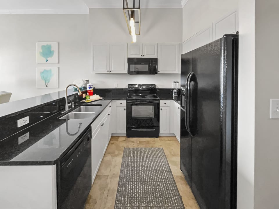 Condo, 3 Bedrooms | Private kitchen | Microwave, oven, coffee/tea maker