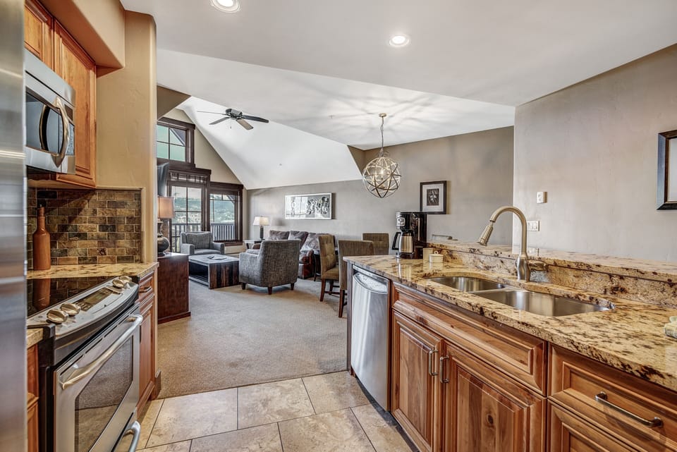 Condo, 2 Bedrooms | Private kitchen | Full-size fridge, microwave, oven, stovetop