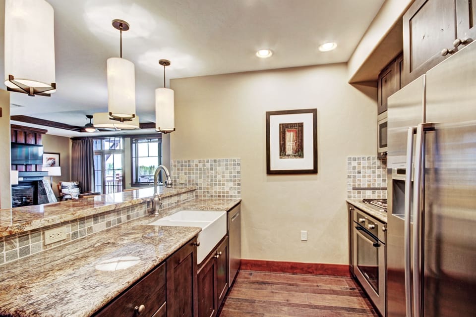 Condo, 1 Bedroom | Private kitchen | Full-size fridge, microwave, oven, stovetop