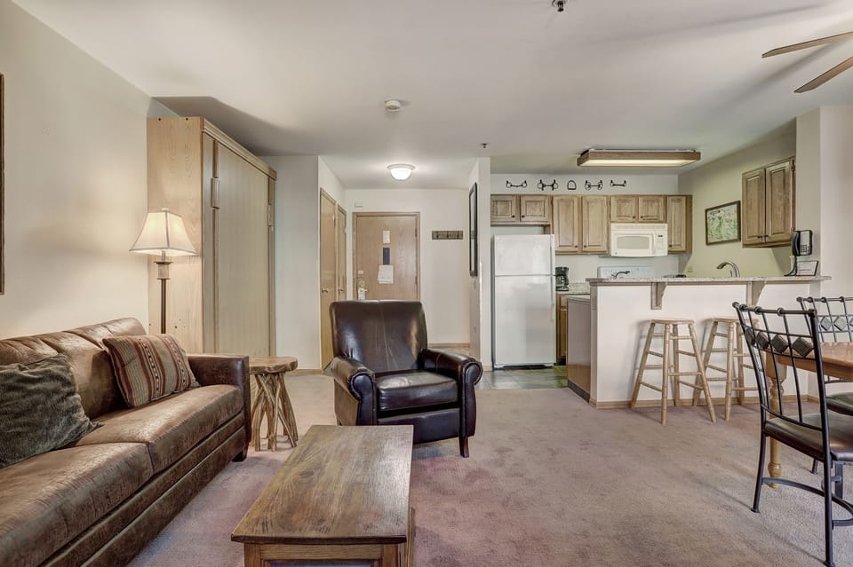 Condo, 1 Bedroom | Living area | Flat-screen TV, fireplace, computer