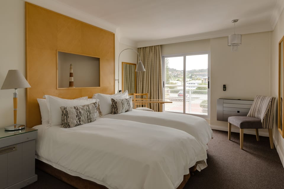 Room, 2 Twin Beds, City View | In-room safe, desk, laptop workspace, iron/ironing board