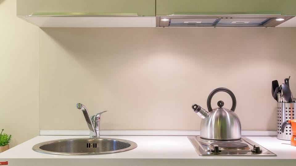 Apartment, 2 Bedrooms | Private kitchenette | Fridge, microwave, stovetop, dishwasher