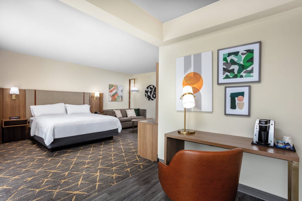 Suite, 1 King Bed (Study Area) | Premium bedding, desk, iron/ironing board, free cribs/infant beds