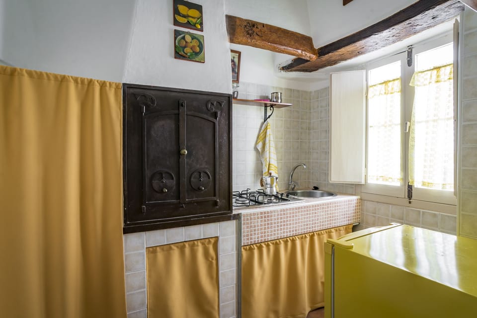 Family Quadruple Room, Kitchen, Mezzanine | Private kitchen | Fridge