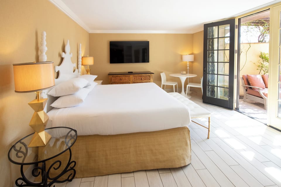 Deluxe Room, 1 King Bed, Terrace (Pool) | In-room safe, desk, laptop workspace, blackout drapes