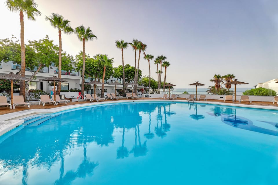 2 outdoor pools, pool umbrellas, sun loungers