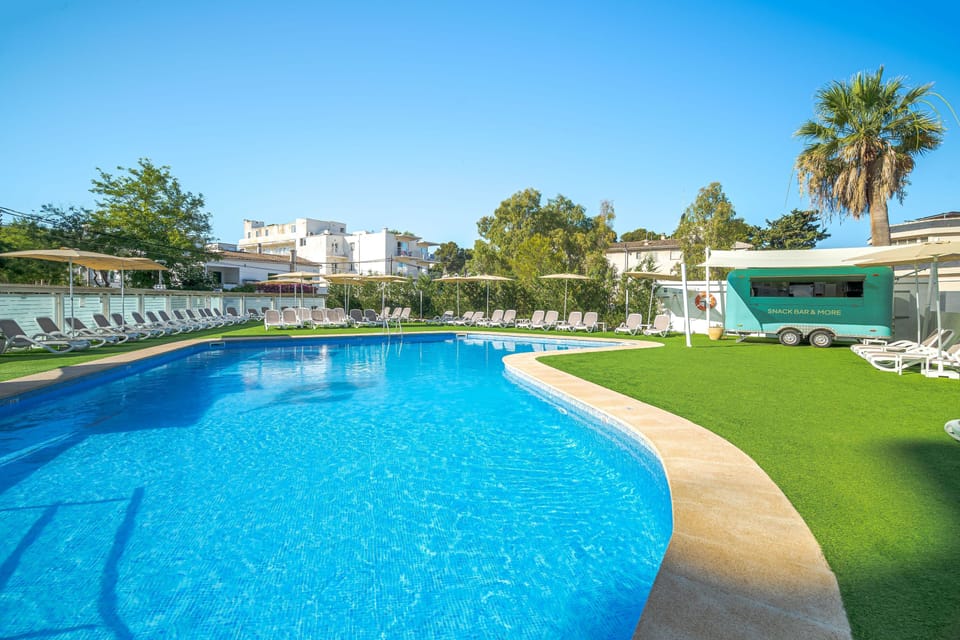 Indoor pool, outdoor pool, pool umbrellas, sun loungers