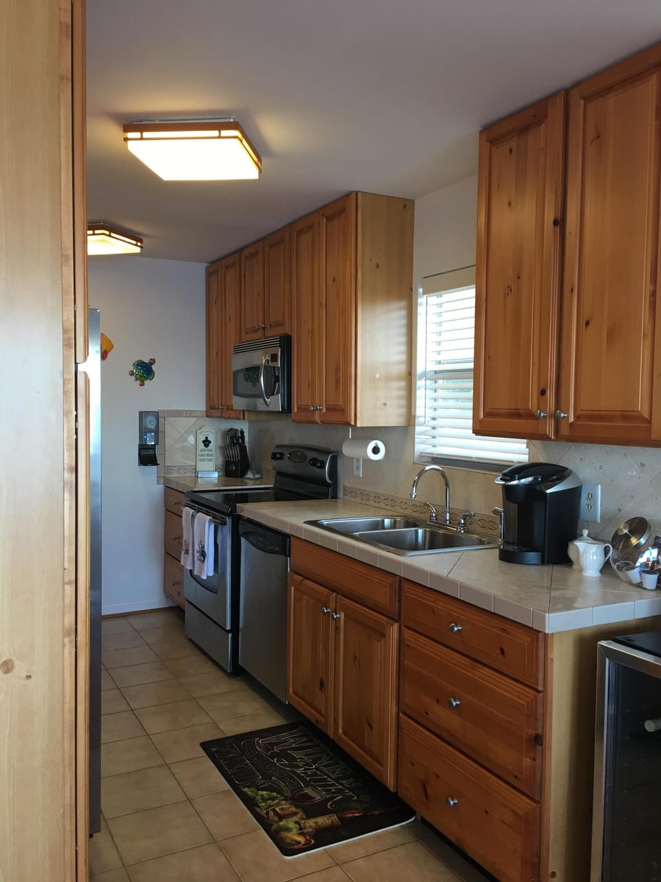 Enjoy the amazing views from the fully stocked, galley style kitchen. 