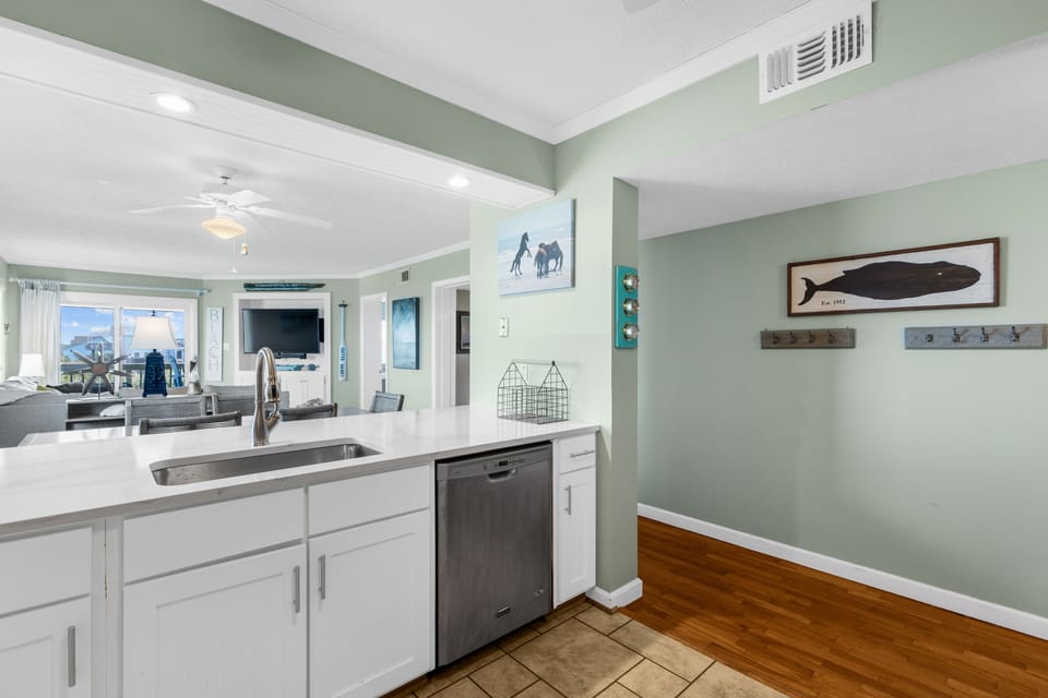 Kitchen remodeled 2022, new countertop height, quartz countertops & backsplash