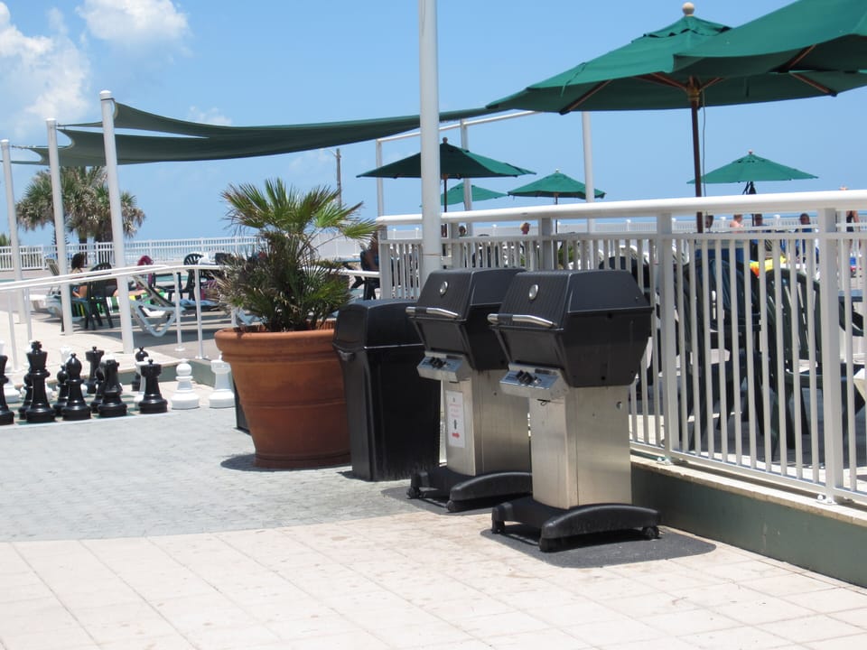 Two of the five gas grills on property