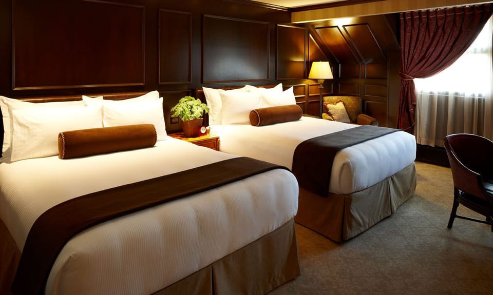 Frette Italian sheets, premium bedding, down comforters, minibar