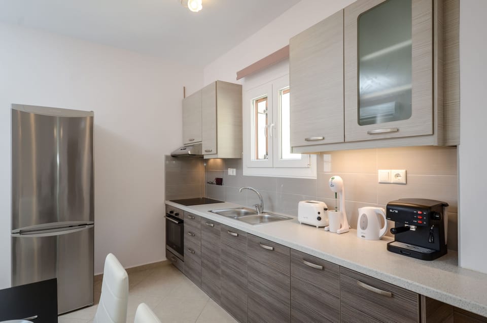 Luxury Sea View Villa with Private Pool | Private kitchen | Full-size fridge, microwave, oven, stovetop