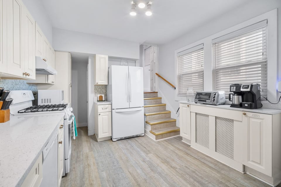 More... Kitchen Featuring Back Stairs
