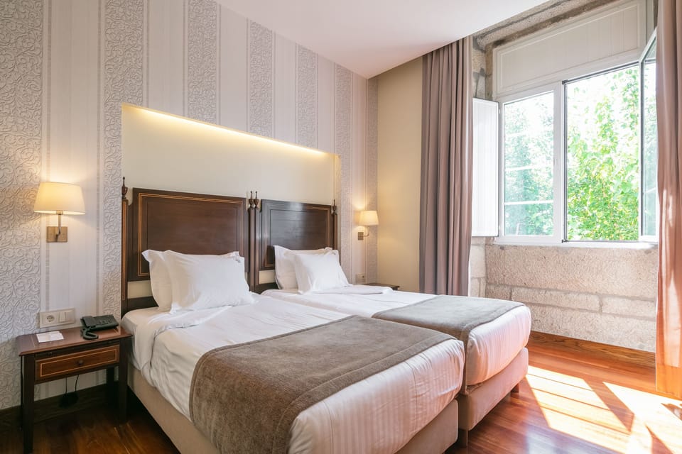 Standard Twin Room | Down comforters, in-room safe, desk, iron/ironing board