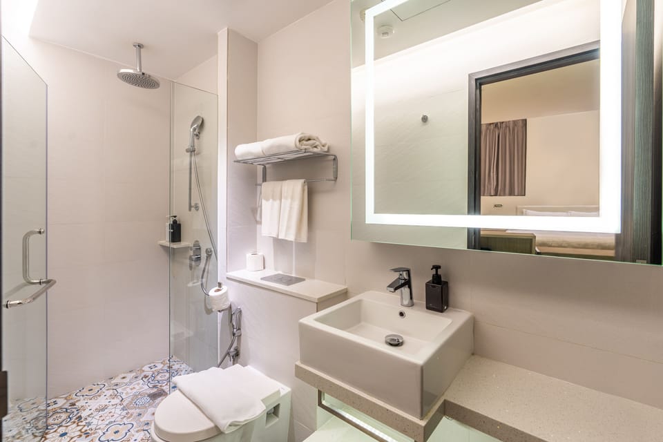 Shower, free toiletries, hair dryer, slippers