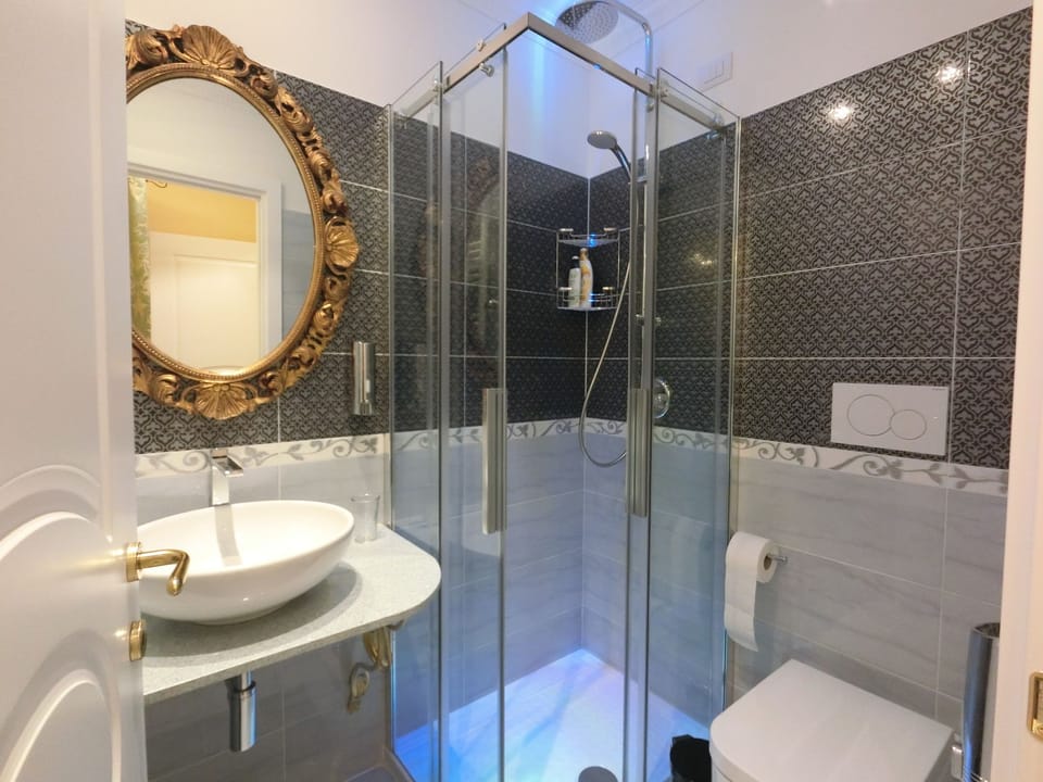 Economy Room, 1 Bedroom | Bathroom | Shower, rainfall showerhead, hair dryer, bidet