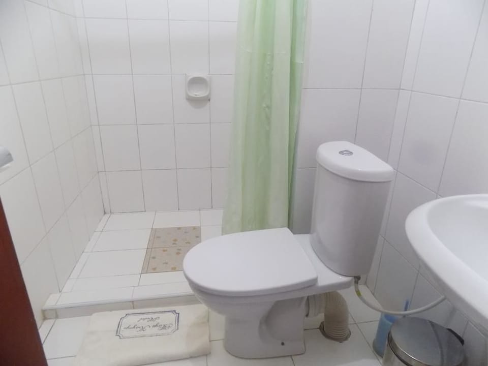 Shower, free toiletries, slippers, towels