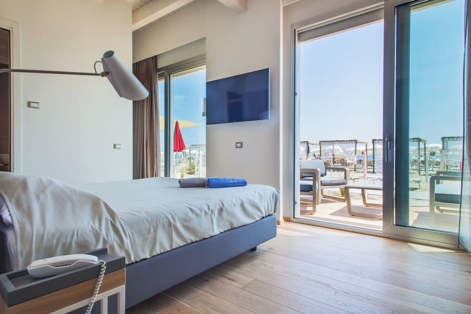 Triple Room, with Beach Access | Terrace/patio